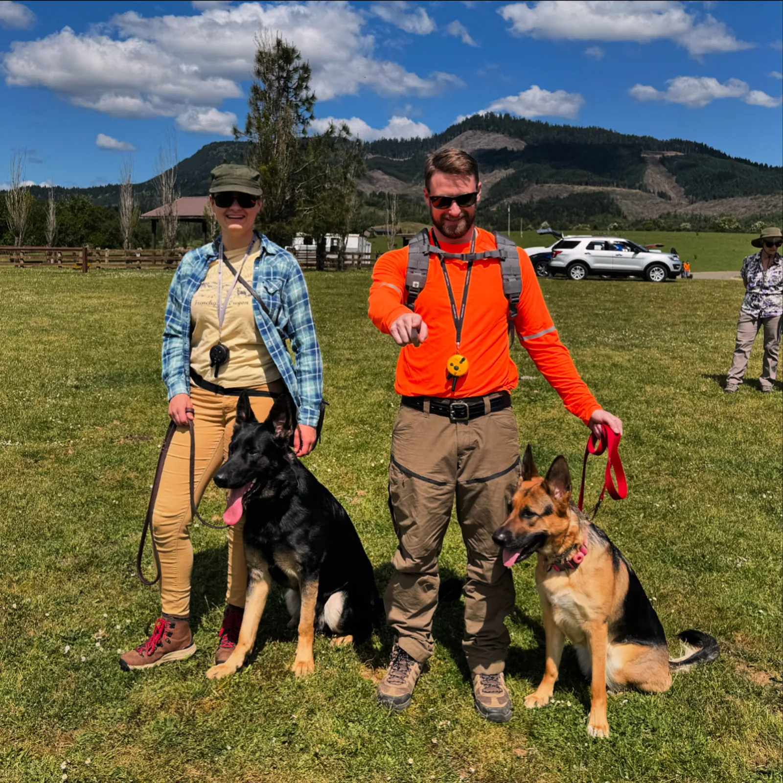 Mitchell and Nala training with another search and rescue K9 team